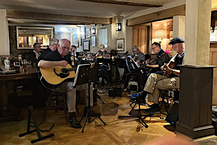 guitar group playing at a local public house